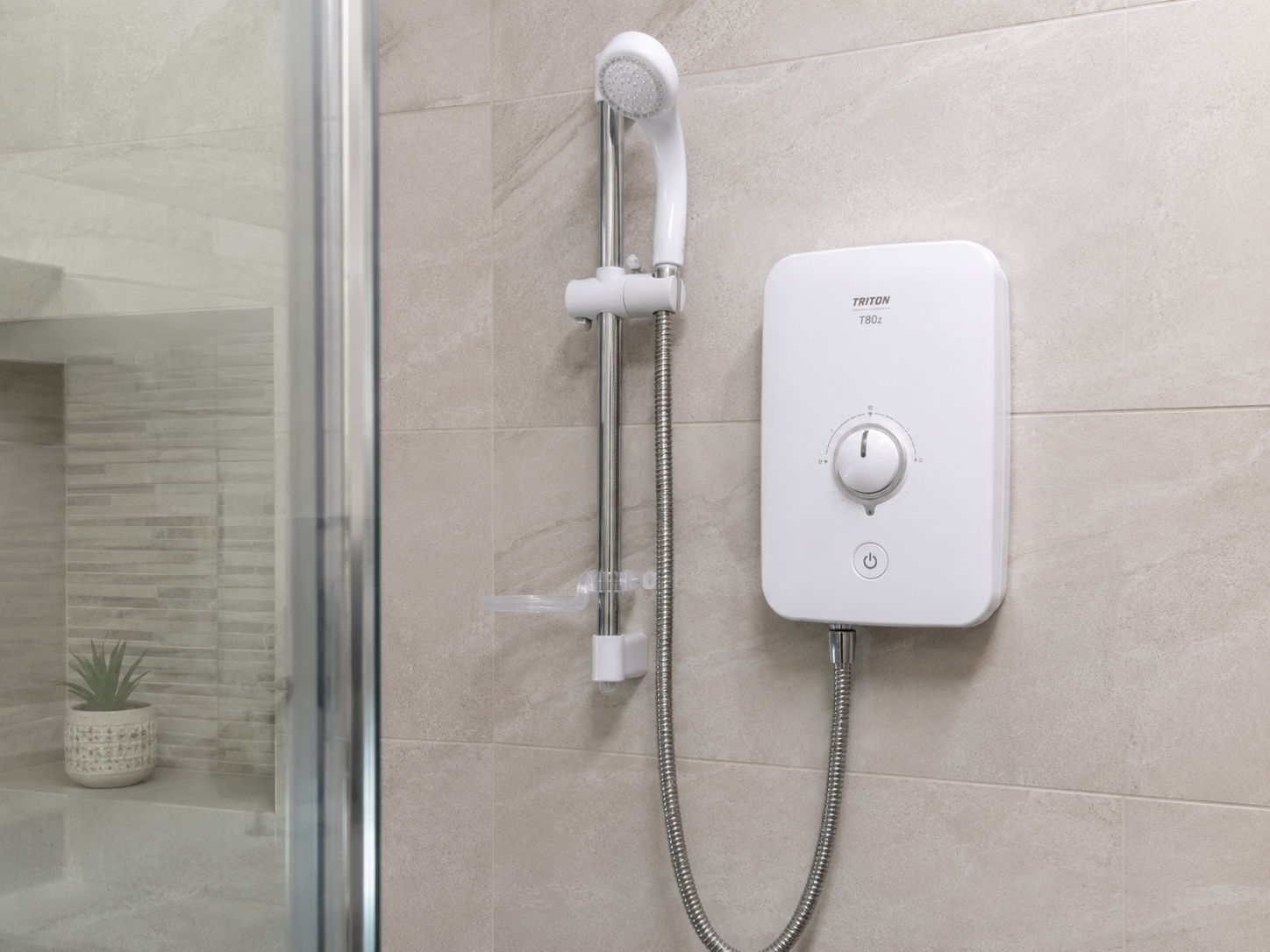Replacement electric shower unit fitted in a clean modern bathroom
